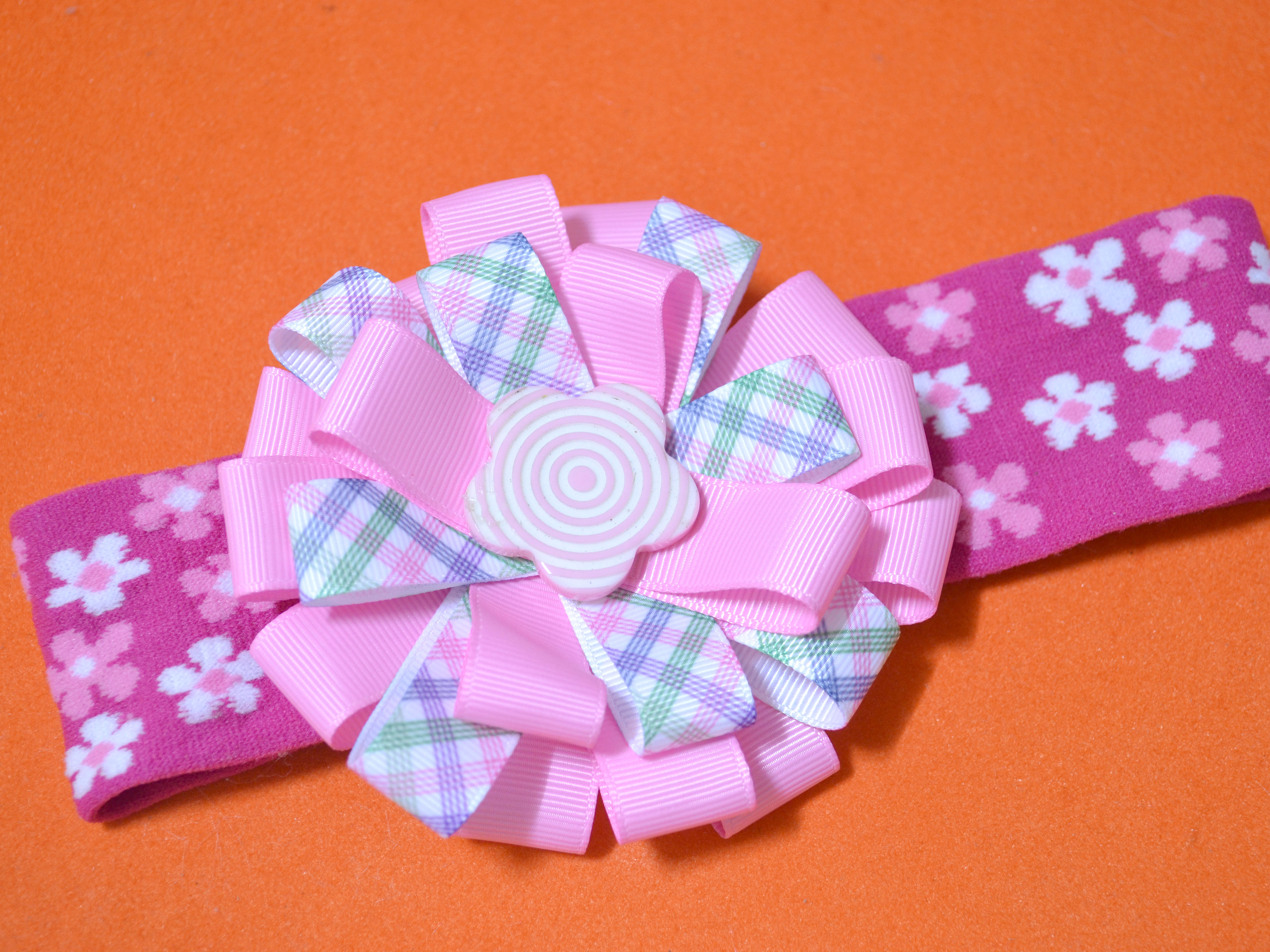 instructions on how to make a bow out of ribbon